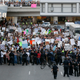 Protestors outside Los Angeles International airport on Sunday (Ryan Kang/Associated Press)